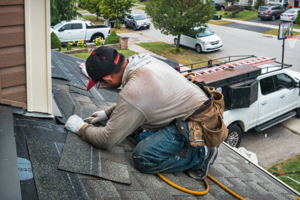 Professional Roof Replacement technician working in Stockdale, TX